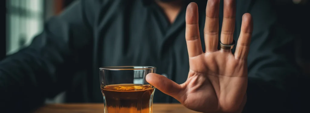 man drinking whiskey