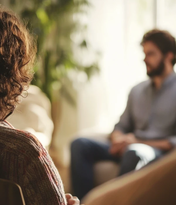 woman-listening-psychologist-therapy-session-with-husband-page
